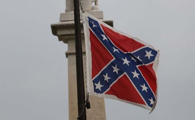 Woman Pulls Down Confederate Flag at State House: Report