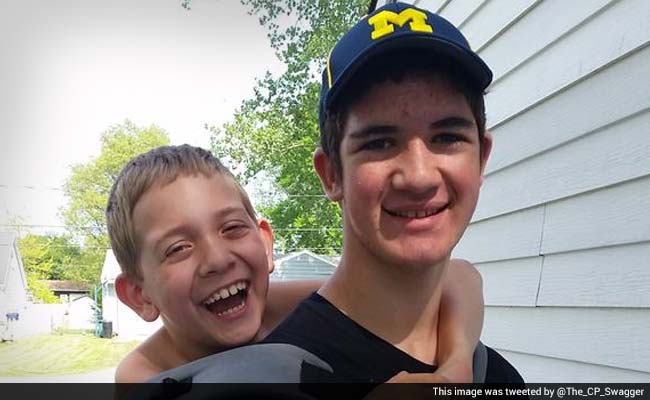 15-Year-Old Boy Completes 57-Mile Walk With Brother on His Back