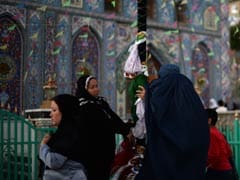 Iran Pilgrims Prevent Nuclear Protest Outside Mosque