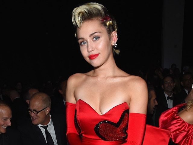 Miley Cyrus' Art, Titled 'The Caitlyn Collection,' Sells For $69,000 at amfAR Gala Auction