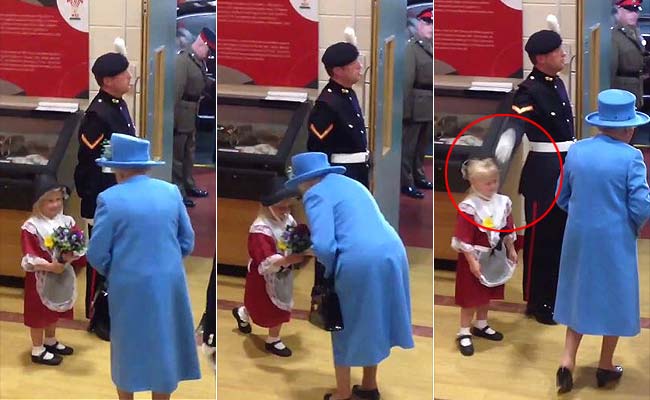 Ouch: Little Girl Hit by Soldier Saluting Britain's Queen