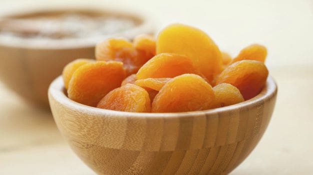 Apricots contain both vitamin A and E
