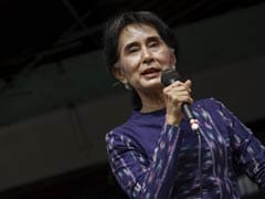 Myanmar's Aung San Suu Kyi Says Party Will Run in Election