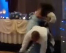 Ouch! Partner's Back Flip Flattens Bridesmaid in Epic Dance Fail