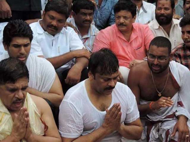 Chiranjeevi Takes Dip in the Godavari at Pushkaralu Festival