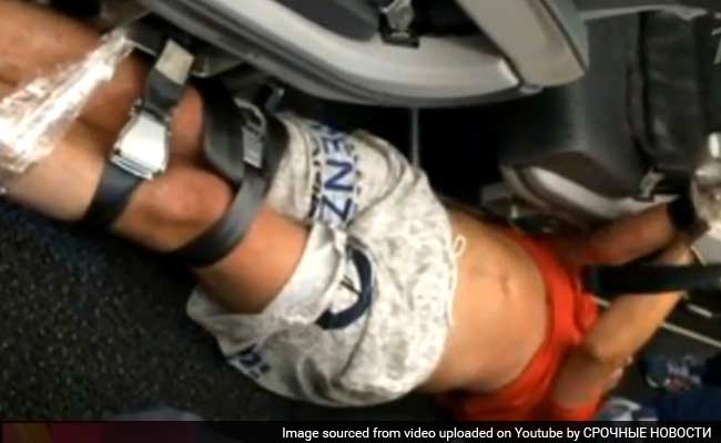 Drunk Passenger Tied Up With Seatbelts, Tape on Flight Drunk Passenger Tied Up With Seatbelts, Tape on Flight
