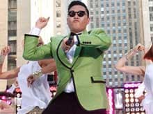 <i>Gangnam Style</i> Singer Psy's Roll Royce Collides With Bus in China