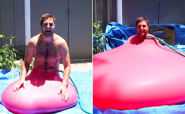 Giant Water Balloon Bursts in Slow Motion with Man Inside. Enjoy