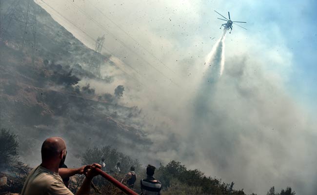 2 Arrested Over Athens Wildfire