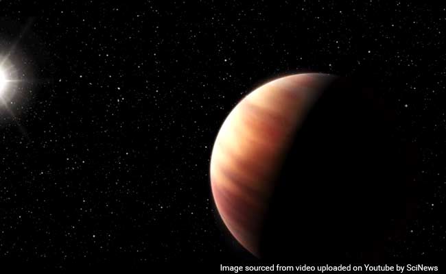 Jupiter's Twin Spotted Orbiting Sun-Like Star
