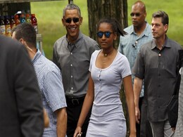 A Man, His Kids, Helicopters and Security Men: Barack Obama in New York's Central Park A Man, His Kids, Helicopters and Security Men: Barack Obama in New York's Central Park