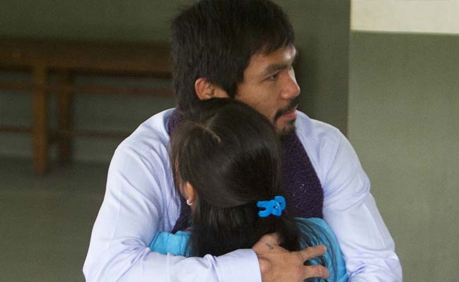 Tearful Prayers as Manny Pacquiao Visits Death Row Filipina