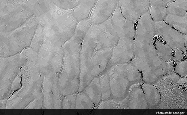 NASA Probe Finds Second Mountain Range in Pluto's 'Heart'