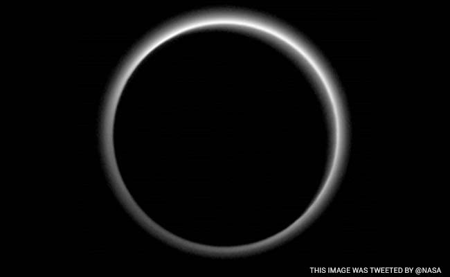 NASA Spacecraft Shows Pluto Wrapped in Haze, Ice Flows
