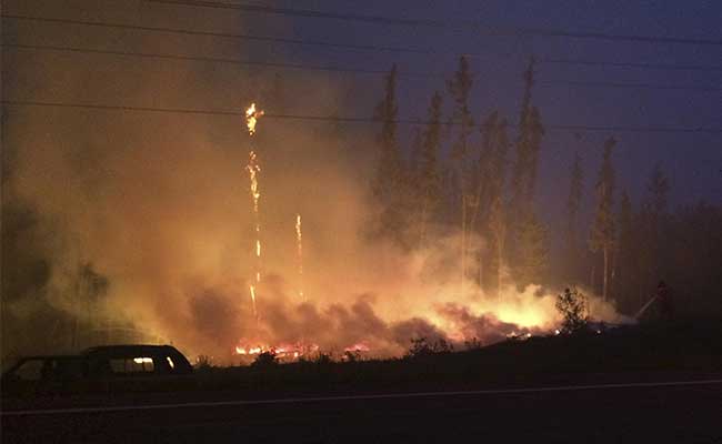 Hundreds of Wildfires Ravage Canada