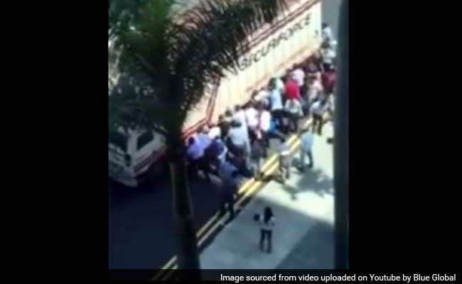 Indian Among 16 People Who Saved Man Pinned Under Back Wheel of Truck Indian Among 16 People Who Saved Man Pinned Under Back Wheel of Truck