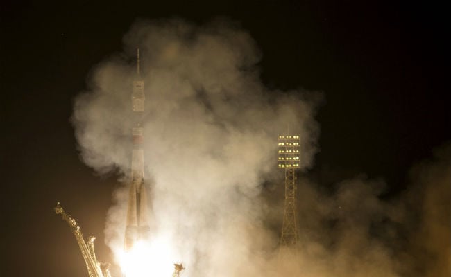 Russian Soyuz Lifts New Crew to Space Station After 2-Month Delay