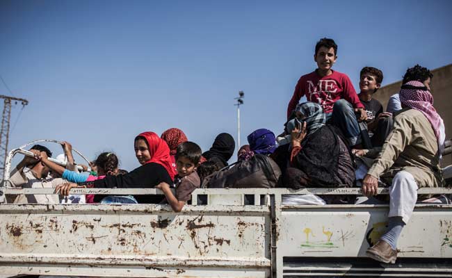 Britain 'to Take 15,000 Syrian Refugees': Report