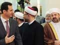 Syria's President Bashar Al-Assad in Rare Public Appearance for Muslim Holiday