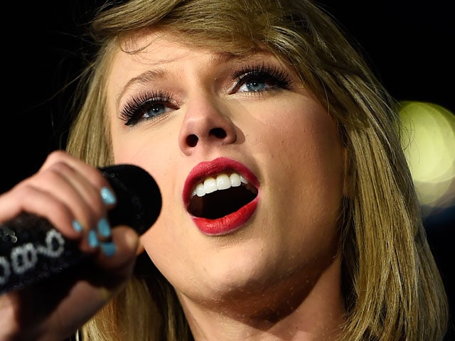 Taylor Swift Revises Photo Access Rules After Criticism