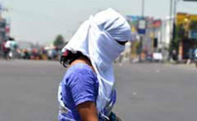 Police Check IDs of Women Riding Bikes With Covered Faces
