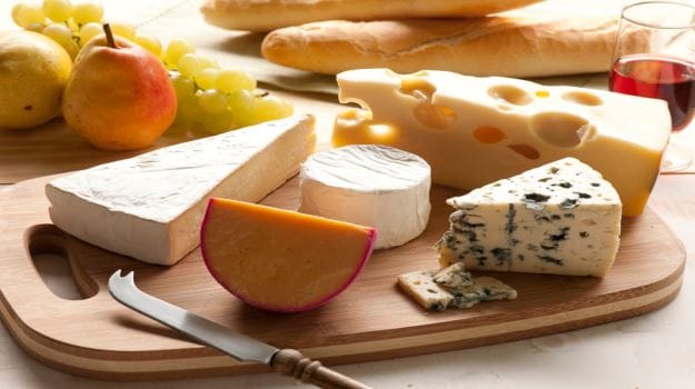 Which cheeses are unsafe for dogs?