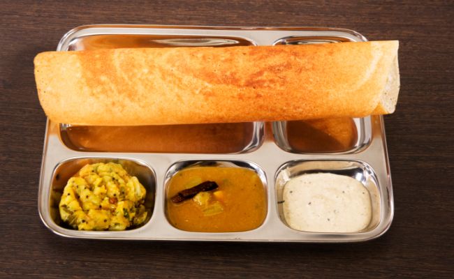 सवाल : डोसा महंगा क्यों होता जा रहा है? रघुराम राजन ने जवाब में तवे को 'दोष' दिया