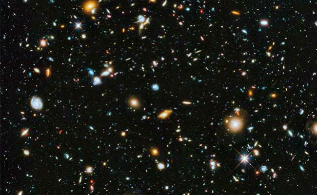Luminous Galaxy Reionizing Surroundings 13 Billion Years Ago