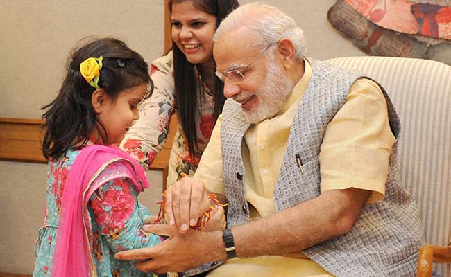 Women, Children Tie Rakhis to Prime Minister Narendra Modi