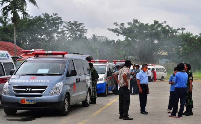 Bad Weather Hampers Recovery Efforts After Indonesia Plane Crash