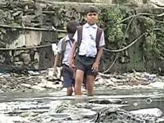 These Mumbai Children Wade Through Knee-Deep Sewage to Make it to School