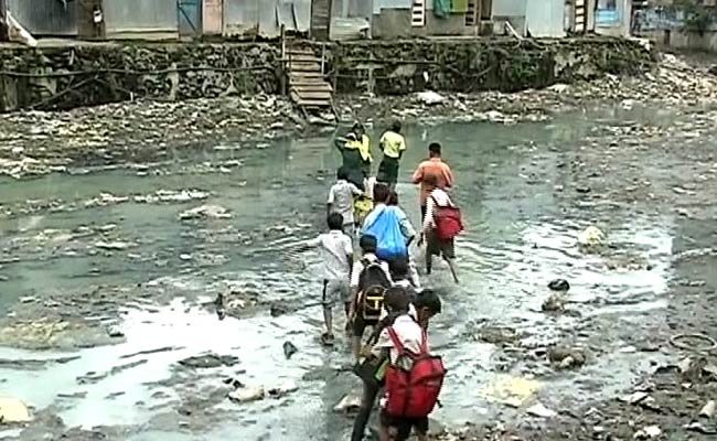For 200 Kids Who Walk Through Sewage to School, Finally, a Bridge