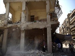 Over 50 People Killed in Syrian Missile Strikes at Rebel Areas Near Damascus Over 50 People Killed in Syrian Missile Strikes at Rebel Areas Near Damascus