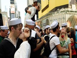 Hundreds of Couples Reenact 'Times Square Kiss' in New York Hundreds of Couples Reenact 'Times Square Kiss' in New York