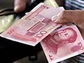 Chinese Yuan to Fall but No Big Devaluation Seen: Poll