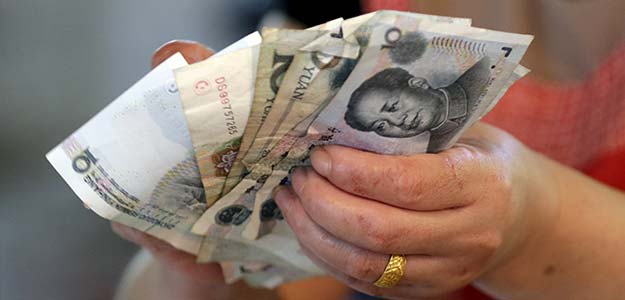 China Banks Warn of Rising Bad Loans as Economy Slows