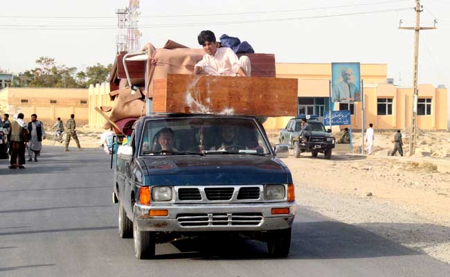 Families Divided, Residents Flee From Afghan City Under Siege