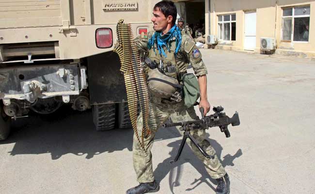 Afghan Forces Battle to Regain Control of City After Stunning Loss