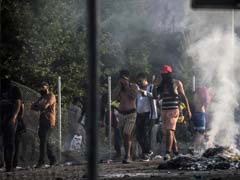 Hungary Police Fire Tear Gas at Migrants at Serbia Border