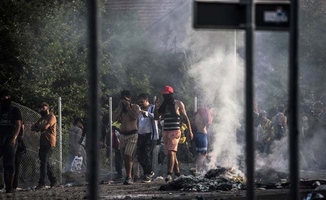 Chaos at Hungary Border as Police Tear Gas Migrants