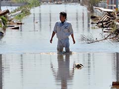 जापान में आई बाढ़ में सैकड़ों लोग फंसे
