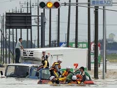 Japan Evacuates 100,000 in Floods Sparked by Rare Torrential Rains