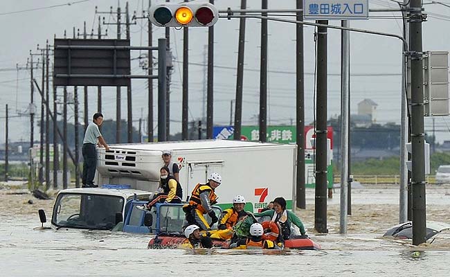 Japan Evacuates 100,000 in Floods Sparked by Rare Torrential Rains