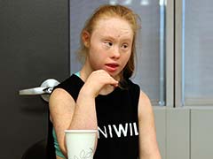 Teen With Down's Syndrome And Bionic Model Walk At New York Fashion Week