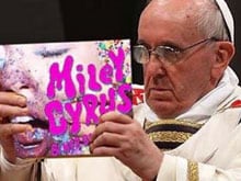 Miley Cyrus Causes Outrage by Photoshopping the Pope Into Her Pic