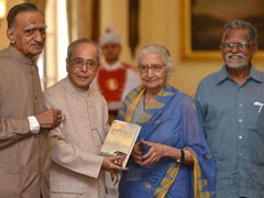 President Pranab Mukherjee Receives First Copy of Book on Muchkund Dubey