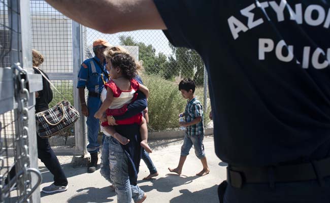 Greece's Lesbos 'Near Explosion' With Over 15,000 Refugees: Minister