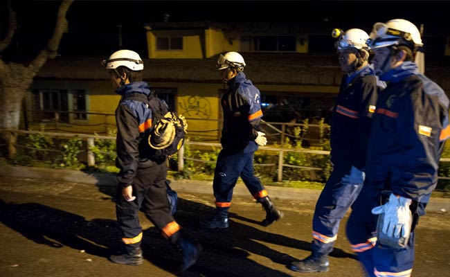 Residents Clear Mud, Rubble as Rebuilding Begins after Chile Quake