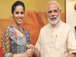 Saina Nehwal Gifts Her Badminton Racquet to PM Narendra Modi Saina Nehwal Gifts Her Badminton Racquet to PM Narendra Modi