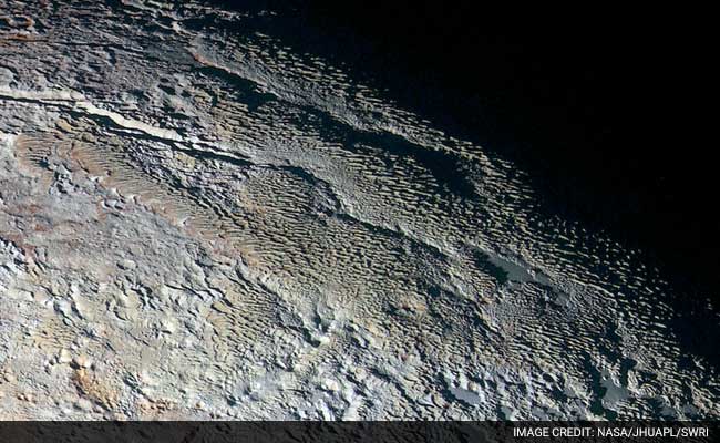 'Snakeskin' Photos Reveal Pluto in Dazzling Details